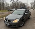 Сірий Міцубісі Lancer, об'ємом двигуна 1.6 л та пробігом 230 тис. км за 2799 $, фото 5 на Automoto.ua
