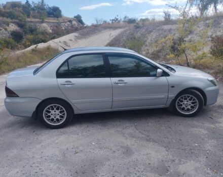 Сірий Міцубісі Lancer, об'ємом двигуна 1.6 л та пробігом 244 тис. км за 3300 $, фото 3 на Automoto.ua
