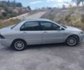 Сірий Міцубісі Lancer, об'ємом двигуна 1.6 л та пробігом 244 тис. км за 3300 $, фото 3 на Automoto.ua