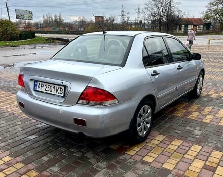 Сірий Міцубісі Lancer, об'ємом двигуна 1.6 л та пробігом 236 тис. км за 3800 $, фото 2 на Automoto.ua