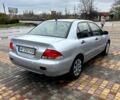 Сірий Міцубісі Lancer, об'ємом двигуна 1.6 л та пробігом 236 тис. км за 3800 $, фото 2 на Automoto.ua