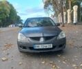 Сірий Міцубісі Lancer, об'ємом двигуна 1.6 л та пробігом 443 тис. км за 2207 $, фото 1 на Automoto.ua