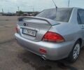 Сірий Міцубісі Lancer, об'ємом двигуна 1.6 л та пробігом 250 тис. км за 4000 $, фото 3 на Automoto.ua
