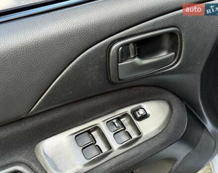 Серый Мицубиси Лансер, объемом двигателя 1.6 л и пробегом 196 тыс. км за 4490 $, фото 12 на Automoto.ua