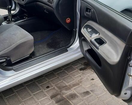 Серый Мицубиси Лансер, объемом двигателя 1.6 л и пробегом 277 тыс. км за 3500 $, фото 5 на Automoto.ua