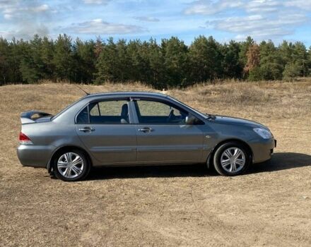 Сірий Міцубісі Lancer, об'ємом двигуна 1.6 л та пробігом 264 тис. км за 5000 $, фото 6 на Automoto.ua