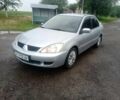 Сірий Міцубісі Lancer, об'ємом двигуна 1.6 л та пробігом 250 тис. км за 2780 $, фото 1 на Automoto.ua