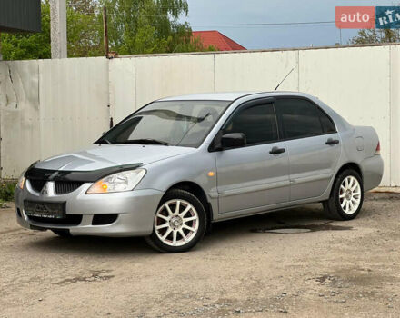 Сірий Міцубісі Lancer, об'ємом двигуна 1.6 л та пробігом 310 тис. км за 3350 $, фото 5 на Automoto.ua