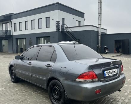 Сірий Міцубісі Lancer, об'ємом двигуна 1.6 л та пробігом 231 тис. км за 3500 $, фото 4 на Automoto.ua