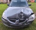 Сірий Міцубісі Lancer, об'ємом двигуна 1.58 л та пробігом 240 тис. км за 1500 $, фото 1 на Automoto.ua