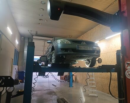 Серый Мицубиси Лансер, объемом двигателя 1.6 л и пробегом 242 тыс. км за 4600 $, фото 2 на Automoto.ua