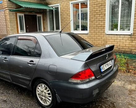 Сірий Міцубісі Lancer, об'ємом двигуна 1.6 л та пробігом 285 тис. км за 4000 $, фото 1 на Automoto.ua