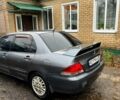 Сірий Міцубісі Lancer, об'ємом двигуна 1.6 л та пробігом 285 тис. км за 4000 $, фото 1 на Automoto.ua