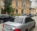 Сірий Міцубісі Lancer, об'ємом двигуна 1.58 л та пробігом 315 тис. км за 2350 $, фото 8 на Automoto.ua