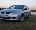 Сірий Міцубісі Lancer, об'ємом двигуна 1.6 л та пробігом 251 тис. км за 4400 $, фото 1 на Automoto.ua