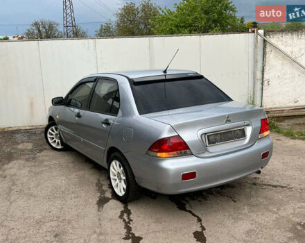 Сірий Міцубісі Lancer, об'ємом двигуна 1.6 л та пробігом 310 тис. км за 3350 $, фото 17 на Automoto.ua