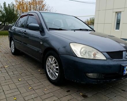 Серый Мицубиси Лансер, объемом двигателя 1.6 л и пробегом 100 тыс. км за 3500 $, фото 2 на Automoto.ua