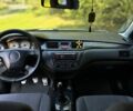 Серый Мицубиси Лансер, объемом двигателя 1.6 л и пробегом 300 тыс. км за 4500 $, фото 1 на Automoto.ua