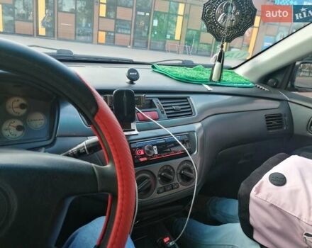 Мицубиси Лансер 2005 в Мукачеве на Automoto.ua Серый Мицубиси Лансер, объемом двигателя 1.6 л и пробегом 416 тыс. км за 4000 $, фото 7 на Automoto.ua