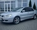 Сірий Міцубісі Lancer, об'ємом двигуна 2 л та пробігом 187 тис. км за 4497 $, фото 3 на Automoto.ua