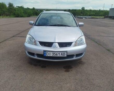Сірий Міцубісі Lancer, об'ємом двигуна 1.6 л та пробігом 250 тис. км за 4000 $, фото 10 на Automoto.ua