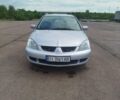 Сірий Міцубісі Lancer, об'ємом двигуна 1.6 л та пробігом 250 тис. км за 4000 $, фото 10 на Automoto.ua