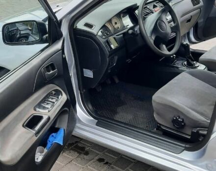 Серый Мицубиси Лансер, объемом двигателя 1.6 л и пробегом 277 тыс. км за 3500 $, фото 3 на Automoto.ua