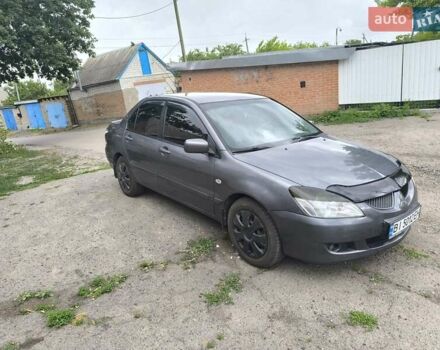 Сірий Міцубісі Lancer, об'ємом двигуна 1.6 л та пробігом 257 тис. км за 3700 $, фото 2 на Automoto.ua