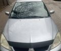 Сірий Міцубісі Lancer, об'ємом двигуна 1.58 л та пробігом 315 тис. км за 2350 $, фото 7 на Automoto.ua