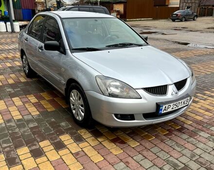 Сірий Міцубісі Lancer, об'ємом двигуна 1.6 л та пробігом 236 тис. км за 3800 $, фото 1 на Automoto.ua