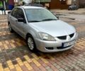 Сірий Міцубісі Lancer, об'ємом двигуна 1.6 л та пробігом 236 тис. км за 3800 $, фото 1 на Automoto.ua