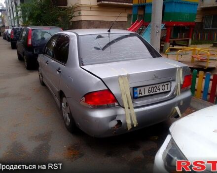 Сірий Міцубісі Lancer, об'ємом двигуна 1.6 л та пробігом 360 тис. км за 1999 $, фото 4 на Automoto.ua
