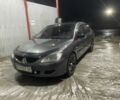 Серый Мицубиси Лансер, объемом двигателя 1.6 л и пробегом 300 тыс. км за 3600 $, фото 1 на Automoto.ua