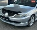Сірий Міцубісі Lancer, об'ємом двигуна 2 л та пробігом 312 тис. км за 4699 $, фото 1 на Automoto.ua