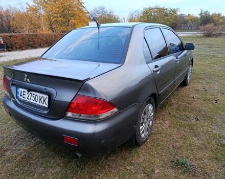 Міцубісі Lancer 2005 у Кам'янське (Дніпродзержинськ) на Automoto.ua Сірий Міцубісі Lancer, об'ємом двигуна 1.6 л та пробігом 220 тис. км за 4100 $, фото 7 на Automoto.ua