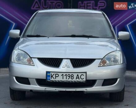 Сірий Міцубісі Lancer, об'ємом двигуна 1.58 л та пробігом 188 тис. км за 3799 $, фото 2 на Automoto.ua