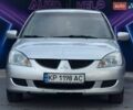 Сірий Міцубісі Lancer, об'ємом двигуна 1.58 л та пробігом 188 тис. км за 3799 $, фото 2 на Automoto.ua