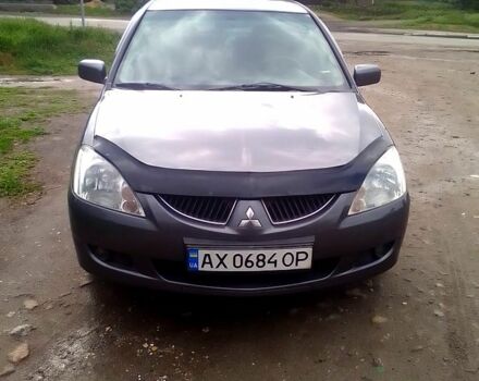 Сірий Міцубісі Lancer, об'ємом двигуна 1.6 л та пробігом 196 тис. км за 5200 $, фото 1 на Automoto.ua