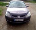 Сірий Міцубісі Lancer, об'ємом двигуна 1.6 л та пробігом 196 тис. км за 5200 $, фото 1 на Automoto.ua