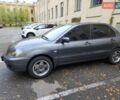 Серый Мицубиси Лансер, объемом двигателя 1.58 л и пробегом 293 тыс. км за 4000 $, фото 13 на Automoto.ua