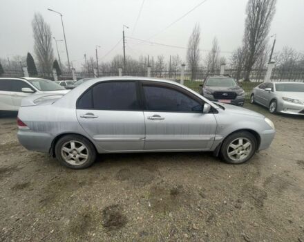 Серый Мицубиси Лансер, объемом двигателя 1.6 л и пробегом 200 тыс. км за 3906 $, фото 2 на Automoto.ua