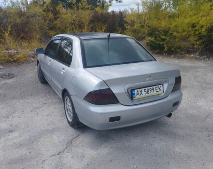 Сірий Міцубісі Lancer, об'ємом двигуна 1.6 л та пробігом 244 тис. км за 3300 $, фото 5 на Automoto.ua