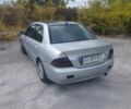 Сірий Міцубісі Lancer, об'ємом двигуна 1.6 л та пробігом 244 тис. км за 3300 $, фото 5 на Automoto.ua