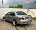 Сірий Міцубісі Lancer, об'ємом двигуна 1.6 л та пробігом 310 тис. км за 3350 $, фото 14 на Automoto.ua