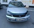 Сірий Міцубісі Lancer, об'ємом двигуна 1.6 л та пробігом 243 тис. км за 3551 $, фото 4 на Automoto.ua