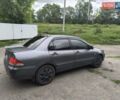 Сірий Міцубісі Lancer, об'ємом двигуна 1.6 л та пробігом 257 тис. км за 3700 $, фото 3 на Automoto.ua