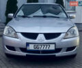Сірий Міцубісі Lancer, об'ємом двигуна 2 л та пробігом 187 тис. км за 4600 $, фото 5 на Automoto.ua