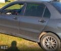Сірий Міцубісі Lancer, об'ємом двигуна 1.6 л та пробігом 222 тис. км за 3500 $, фото 2 на Automoto.ua