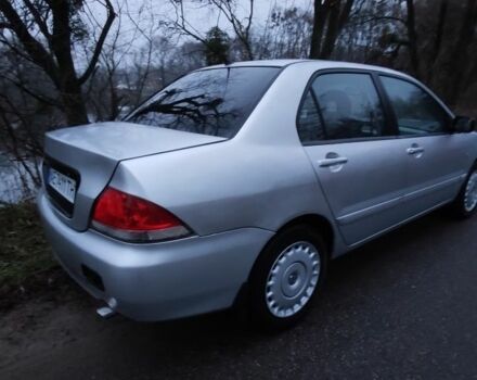 Серый Мицубиси Лансер, объемом двигателя 1.6 л и пробегом 235 тыс. км за 2850 $, фото 11 на Automoto.ua