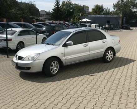 Сірий Міцубісі Lancer, об'ємом двигуна 1.58 л та пробігом 274 тис. км за 4400 $, фото 5 на Automoto.ua